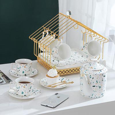 China Sustainable Luxury British Ceramic Household Terrazzo Design Coffee Mug Set Teapot And Cup Set Tea Set With Iron Stand for sale