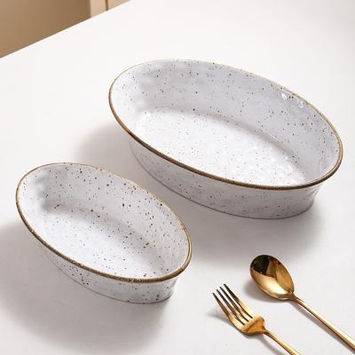 China New Design Oval Ceramic Casserole Stain Stocked Baking Dishes Non Stick Kitchen Bakeware Mold for sale