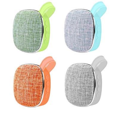 China Wireless Outdoor Fabric X25 Mini Wireless BT Speaker With magnet TWS support silicon handle handfree call for sale