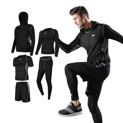 China Anti-Static Running Suit Men's Casual Fitness Clothing Sports Shorts Quick-Drying Tights Short Sleeve Training Sportswear 5 Piece Set for sale