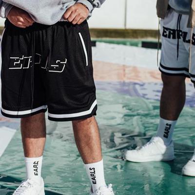 China QUICK DRY fitness loose big letter men's sports knee length the same casual amazon shorts five point basketball shorts for sale