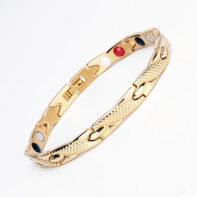 China TRENDY in fashion current par gold plated alloy snake pattern twisted healthy therapy chain stone stone unisex magnetic bracelet for sale