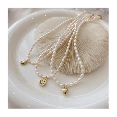 China 2021 Cute Korean Freshwater Love Smiley Face Smiley Face Pearl Jewelry Pendant Necklace 18K Gold Plated Beaded Pearl Smiley Necklace for sale