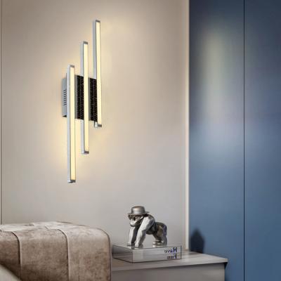 China New Design Artistic Style HUAYI Chrome LED Aluminum Wall Lamp Living Room Modern Cloakroom Decor for sale