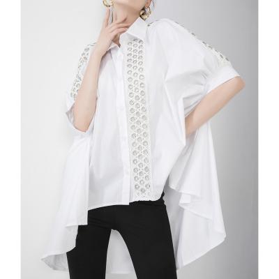 China Anti-Wrinkle Women Lace Up Batwing Metal Iron Buckle Blouse Loose Sleeve Lapel Short Front And Long Back Tops Dovetail Shirt for sale