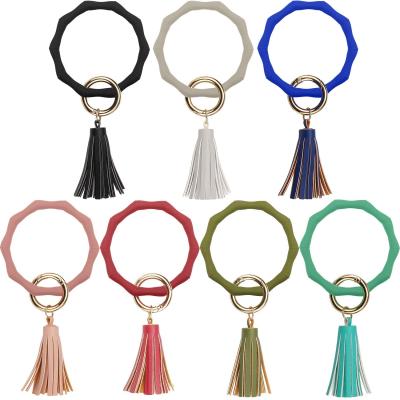 China Key Holder Keychain High Quality Bracelet Wristband Silicone Key Chain Band With Key Ring for sale