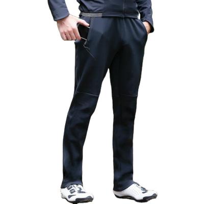 China Breathable autumn and winter riding windproof pants men and women mow outdoor warm windproof pants bicycle casual pants for sale