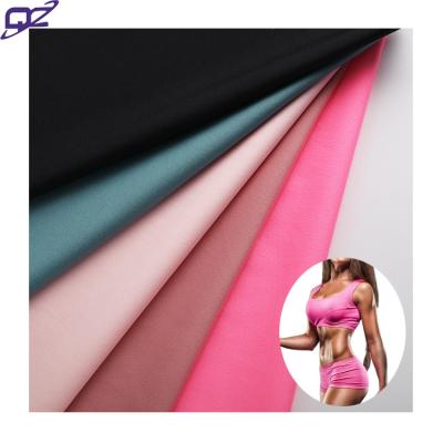 China Anti pill high stretch 50DTY polyester spandex elastic knit interlock fabric for gym fitness sets tracksuits women yoga wear sharpwear for sale