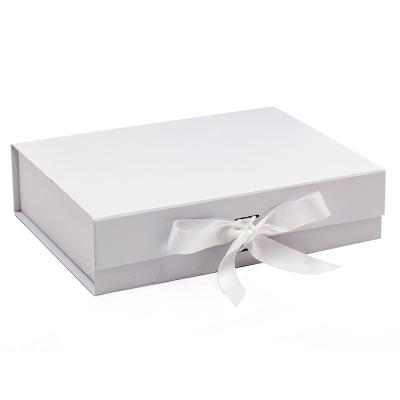 China Recycled Custom White Folding Materials Cardboard Magnetic Flip Top Ribbon Gift Boxes With Magnetic Closure for sale