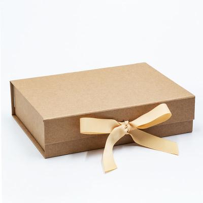 China Recycled Materials Bulk Custom Luxury Magnetic Closing Cardboard Kraft Paper Flat Pack Lid Gift Boxes With Ribbon for sale