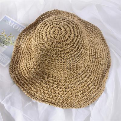 China Korean Dobby Hook Ladies Bow Tie Cavity Sunshade Sunblock Hat Folding Big Eaves Ladies Straw Hat Sunblock Beach Hat for sale