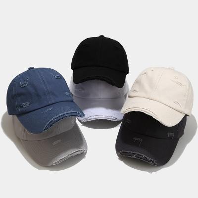 China New Four Seasons fashion brand men's and women's hole hat men's and women's retro distressed denim JOINT baseball cap four seasons fashion couples hat for sale