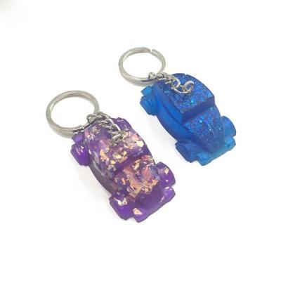 China Fashion Custom Free Shipping Hot Sale OEM Design Instu Type Key Holder Car Form Glitter Plastic Resin Key Chain for sale