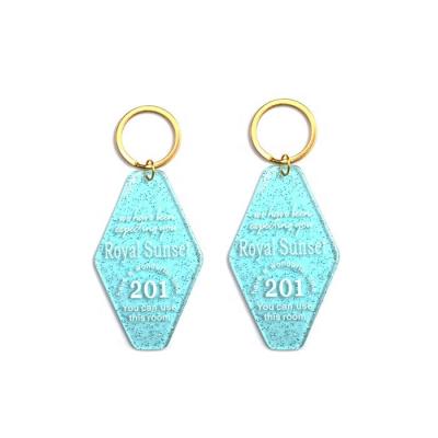 China High Quality Central Statistical Favor Korea Plastic Number Tag Custom Type Printed Logo Clear Glitter Acrylic Keychain for sale