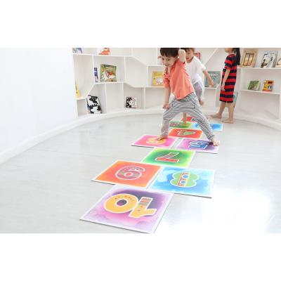 China Sensory education; Nursery Indoor Kids Toys 400x400mm Kindergarten Playroom Hopscotch Play Mat Sensory Liquid Flooring Removable Tiles for sale