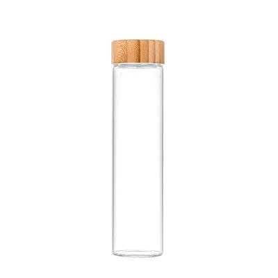 China 50ml chemical glass bottle with bamboo cover bird sauce bottle bird's nest high borosilicate honey bamboo capsule bottles for sale