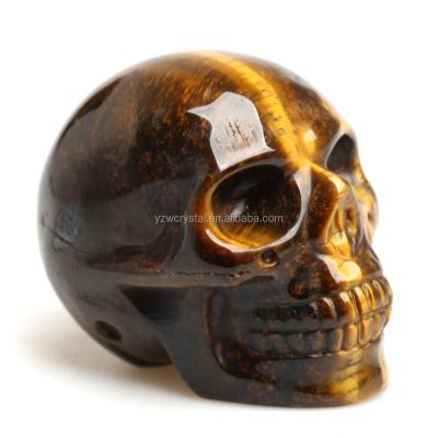 China China Popular Natural Hand Carved Crystal Skulls Tiger Eye Skulls For Healing for sale