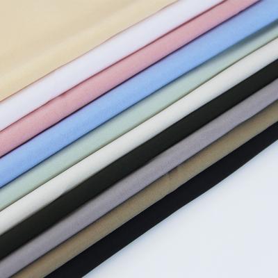 China Factory Wholesale Cheap 100D Stretch 90% Polyester 10% Spandex Four Way Shirt Fabric Shrink-Resistant For Dress Garment Lining for sale