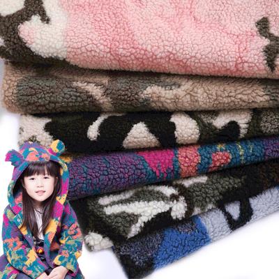 China 14 Color Camouflage Jacquard Sherpa Lamb Fleece Anti-static Thermal Fabric For Winter Coat Jackets for sale