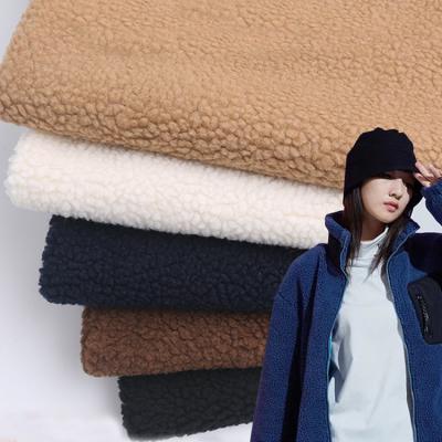 China Anti-Static High Quality Medium Grain 100% Polyester Sherpa Fleece Knitted Fabric For Coat Sweater for sale