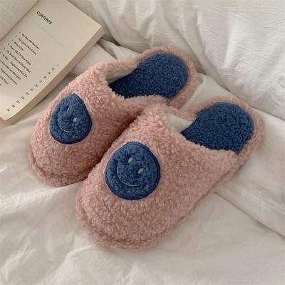 China Qznike Cute Smiling Face Winter Plush Terry Fur Home Slippers Lightweight Hot Selling Slippers For Women for sale