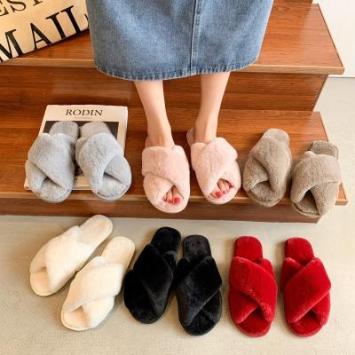 China Cushioning Soft Indoor Home Fuzzy Slippers Fur Cross Open Fluffy Toe Fur Slides Comfortable Dropshipping Women's Fashion Slippers for sale