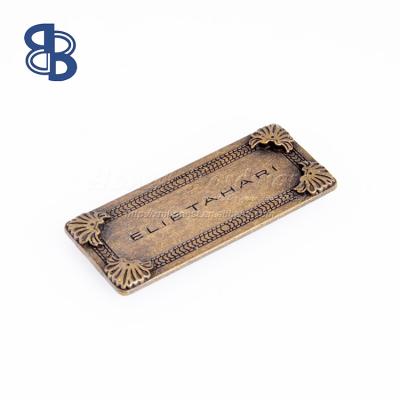 China Custom Zinc Alloy Designer Metal Label Handbag Logos for sale