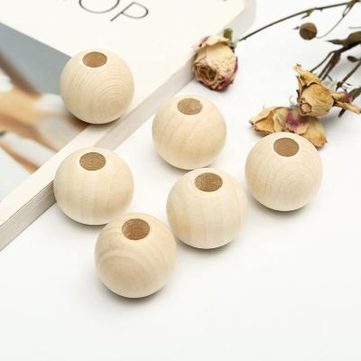 China Decoration or DIY/For Jewelry Making Fashion High Quality 50mm Natural Color Wooden Beads Round Wooden Bead For Necklace for sale