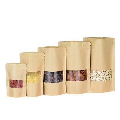 China Good sealing position up pouches thickened kraft paper bag with window for sale