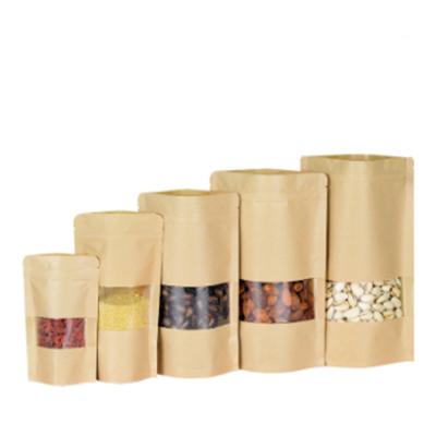 China Good sealing position up pouches thickened kraft paper bag with window for sale