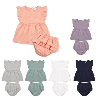 China New Fashion Antibacterial Hot Sale Newborn Baby Clothes Muslin Fabric Baby 2pcs Cotton Clothing Set for sale