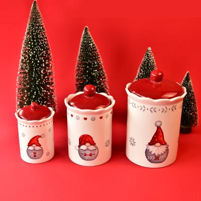 China New Christmas 2021 Santa Claus North European Santa Red Color Viable Storage Cookie Ceramic Jar With Silicone Airtight Lid for sale