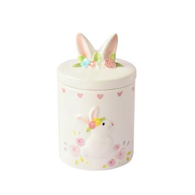 China Viable Bunny with Rose Followers Laurel Wreath Ceramic Cookie Jar Canister with Bunny Rabbit Ears Lid for sale