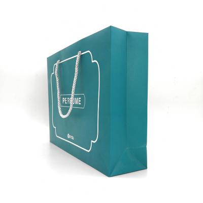 China Custom Print Recyclable Logo Luxury Paper Bag With Handle High Quality Gift Perfume Packaging Paper Shopping Bag for sale