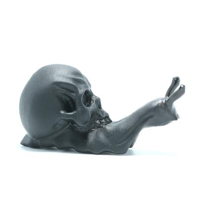 China New Product Hot Sale Folk Art Wholesale Natural Crystal Snail Carving Black Skulls Healing Cute Obsidian Snail Skulls For Gifts for sale