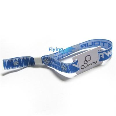 China All Over The Word Merchandise Promotional Event Wrist Bands Woven Disposable RFID Wristbands With Clip for sale