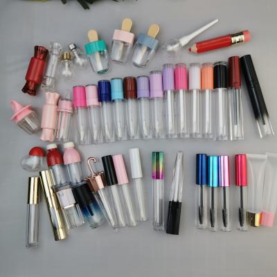 China Wholesale Empty Container Glitter Lip Gloss Tube Pink Lip Gloss Sunscreen Lip Gloss Tube With Brush for sale