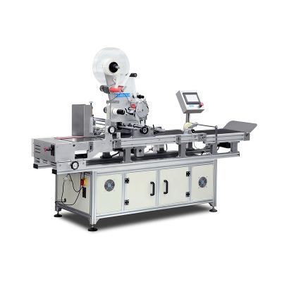 China KAMGOLD Precise Automatic Food RFID Single Head Adhesive Labeling Machine For Clothing Label for sale