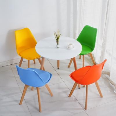 China (Other)Wholesale Nordic Contemporary Design Adjustable Polypropylene Tulip Room Plastic Dining Chairs With Beech Wood Leg for sale