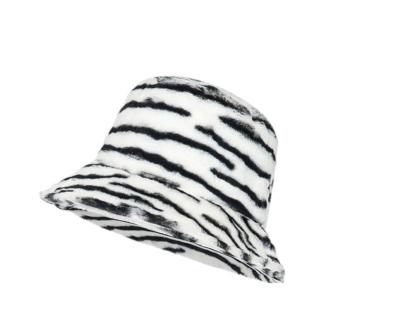 China European and American women's COMMON tide hat winter black and white striped plush warm fisherman hat simple and fashionable for sale