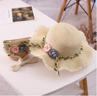 China 2022 Soft Comfortable Korean Children's Cute Straw Summer Beach Hat And Bag Set For Children for sale