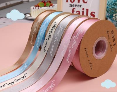 China Polyester ribbon flower gift box clothing accessories ribbon printed logo ribbon 50 yards/roll 2.5cm Te koop