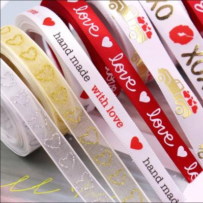 中国 Print Christmas Gift Ribbon Decoration Roll Craft Decor Wire Festival Grosgrain With Wire Edged Satin Ribbon 販売のため