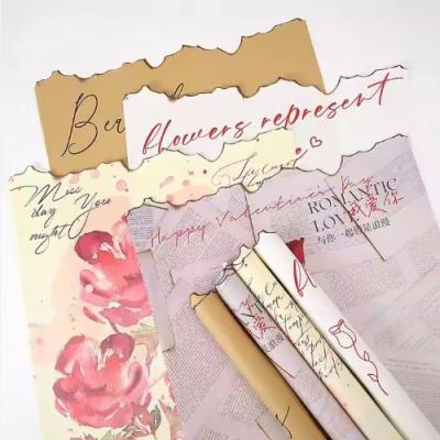 China Waterproof Florist Wrapping Bouquet Packing Paper Love Letters Print Flower Wrapping Paper for sale