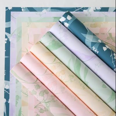 China 2024 Flower Bouquet Wrapping Paper Patterned Waterproof Floral Plastic Wrapping Paper For Fresh Flower Wholesale for sale