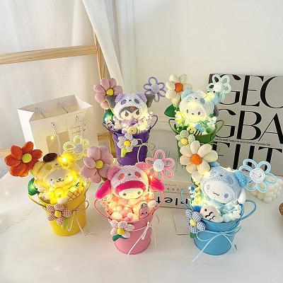 China Plush immortal flower potted cartoon animal doll doll holding flowers for teachers Chinese Valentine's Day gift Teacher's Day gift for sale