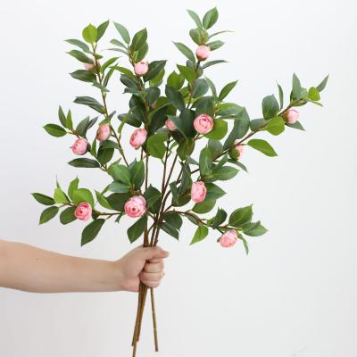 Chine Des fleurs artificielles de camélia pour la photographie de mariage à vendre