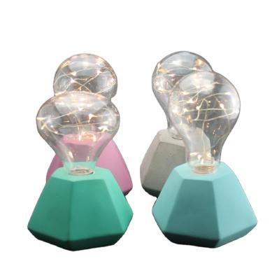 China Hotel cement table desk lamp with plastic bulb in colorful shiny led lights / desk lamp led for sale