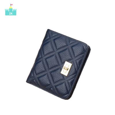 China Women's Travel Bi-fold Accessory Wallet Short Top Layer Cowhide Shorts Ladies Wallet Fashion Rhombus Buckle Anti-theft Leather Ladies Wallet for sale