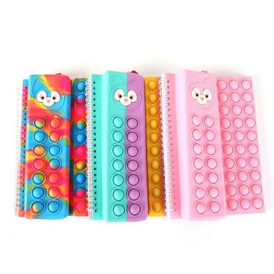 China 2022 New Multifunctional Cute Spiral Cartoon Silicone Bubble Decompression Rat Killer Pioneer With Pencil Case Spiral Notebook Set for sale